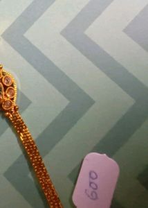 Gold Tone Bajuband with Red and Green Stones