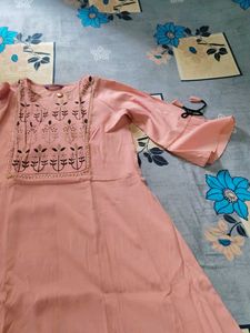 Elegant Pink Kurta with Embroidered Neckline