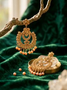 Exquisite Gold Jhumka Earrings with Pearls