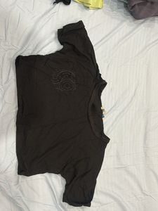 Stylish Black T-Shirt with Lace Pocket