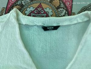 off white  Ruched Blouse with Floral Accent