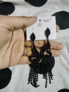 Elegant Black Dangle Earrings and bluish earings