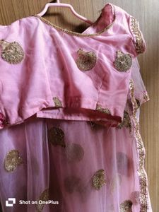Pink net saree with sequin zari motifs