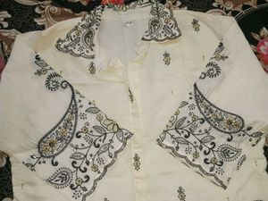 Cream Kurta with Intricate Embroidery
