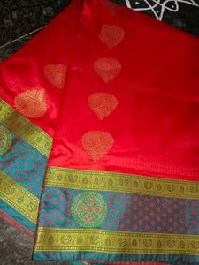 Vibrant Red Saree with Teal Border
