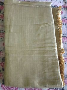 Elegant Gold Striped Fabric with Tassel Trim
