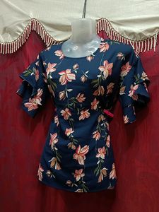 It Is Jean Top With Blue Floral Design.