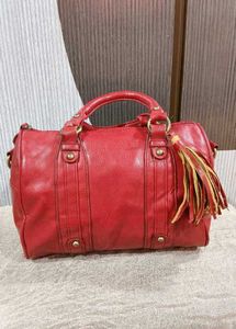 Chic Red Leather Handbag with Tassel