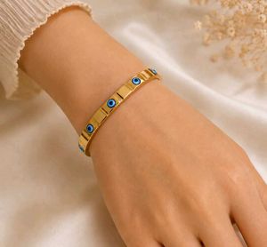 Gold Tone Evil Eye Bangle Bracelet