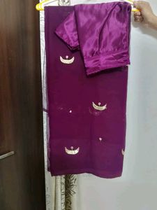 Elegant Purple Saree with Gold Embellishments