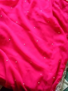 Vibrant Pink Saree with Pearl Embellishments