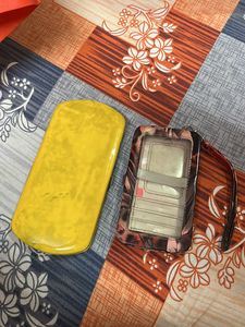 2 Clutches And 1 Handbag