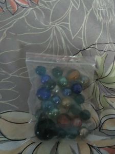 Bag of colorful glass marbles