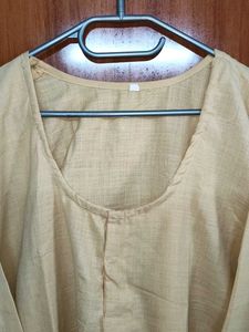 Elegant Beige Kurta with Zigzag Trim