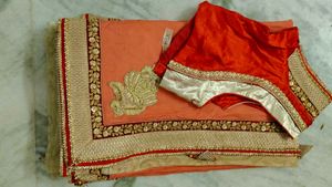 Elegant Peach Saree with Red Blouse