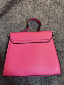 brand new Barbie pink bag with crossbody strap
