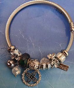 Charm Bracelet with Unique Pendants