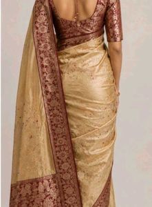 Elegant Gold and Maroon Silk saree