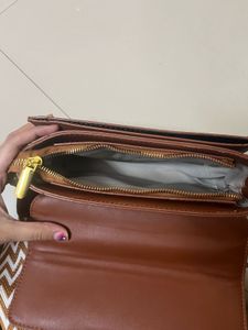 Chic Brown Crossbody Bag with Patterned Strap