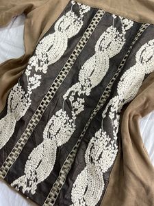 Brown long sleeve top with embroidered detail