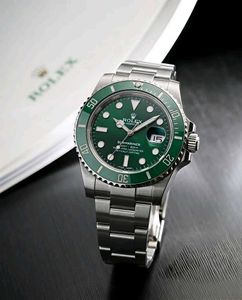 Luxury Gold &amp; Green Rolex Watch