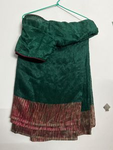 Elegant Green Saree with Red Border