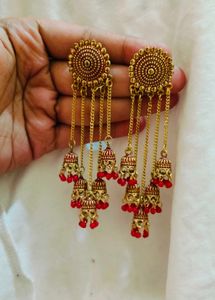 Golden Jhumka Earrings with Red Beads 💎