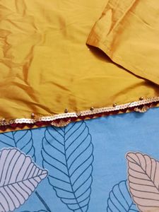 Elegant Yellow Kurta Set with Intricate Embroidery