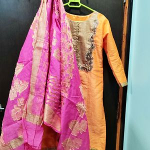 Orange Ethnic Suit Set With Pink Dupatta