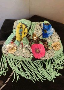 Beaded bag with tassel.