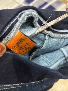 Stylish Dark Wash Jeans with Gold Stripe