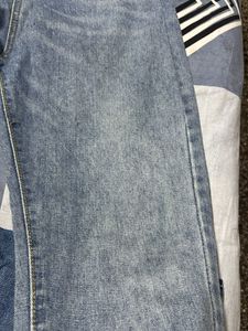 Ripped Blue Denim Jeans