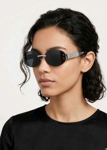 Celine Oval Rimless Sunglasses