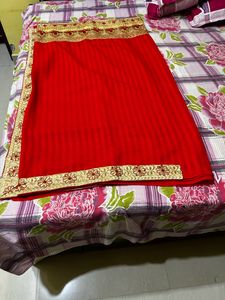 Elegant Red Saree with Golden Border