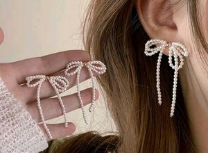 Elegant Pearl Bow Drop Earrings