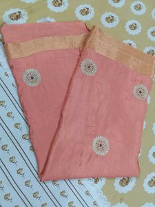 Elegant Peach Saree with Intricate Embellishments