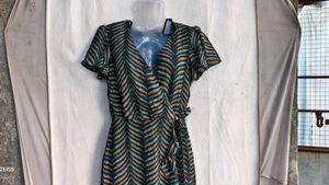 4929. Chic Wrap Dress with Ruffle Detail