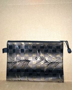 Stylish Woven Pouch with Feather Design