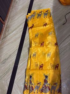 Vibrant Yellow Saree with Folk Art Print