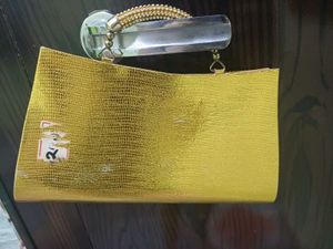 Elegant Gold Embellished Clutch Bag