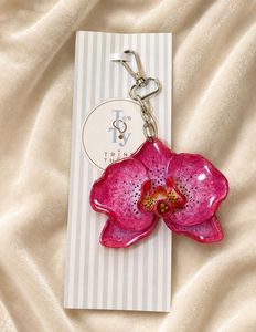 Handsculpted, hand painted, Orchid BAGCHARM