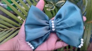 Elegant Black Pearl Bow Hair Clip