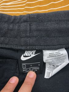 dark grey Nike joggers