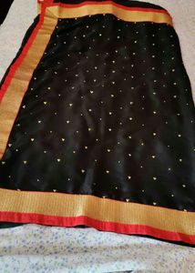 Elegant Black Saree with Gold &amp; Red Border