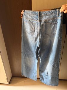 Wide Leg Ripped Jeans waist- 32 length- 102 cm