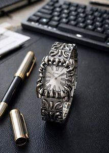 Silver Tone Watch with Intricate Design