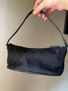 Gucci Monogram boat pochette bag