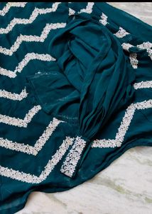 Beautiful Teal Saree with White Embellishments