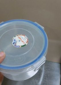 four Plastic Food Containers