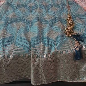 Beautiful Teal Lehenga with Intricate Embroidery